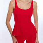 Red peplum top and pants on a white background