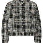 A cropped, long-sleeve button-front jacket with a high stand collar, featuring a black, white, and gray plaid tweed pattern.