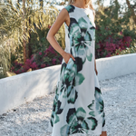woman in floral printed dress outside