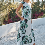woman in floral printed dress outside