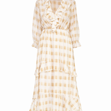Checkered dress with ruffled details on a white background