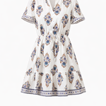 White dress with blue and red pattern on a white background