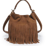 Brown suede handbag with fringe details on a white background
