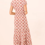 Printed midi dress with a flowing silhouette, styled for everyday wear.