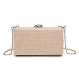 Beige clutch bag with a chain strap on a white background