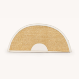 Semicircular woven mat with a white border on a white background