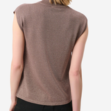 A woman shown from the back wearing a sleeveless mock neck knit top in a dusty mauve-brown color, paired with black trousers, against a light gray studio background.
