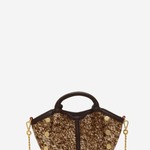 A structured handbag with a brown and gold glittery textured body, dark brown leather trim, top handle, and gold-tone chain strap, shown on a plain light gray background.
