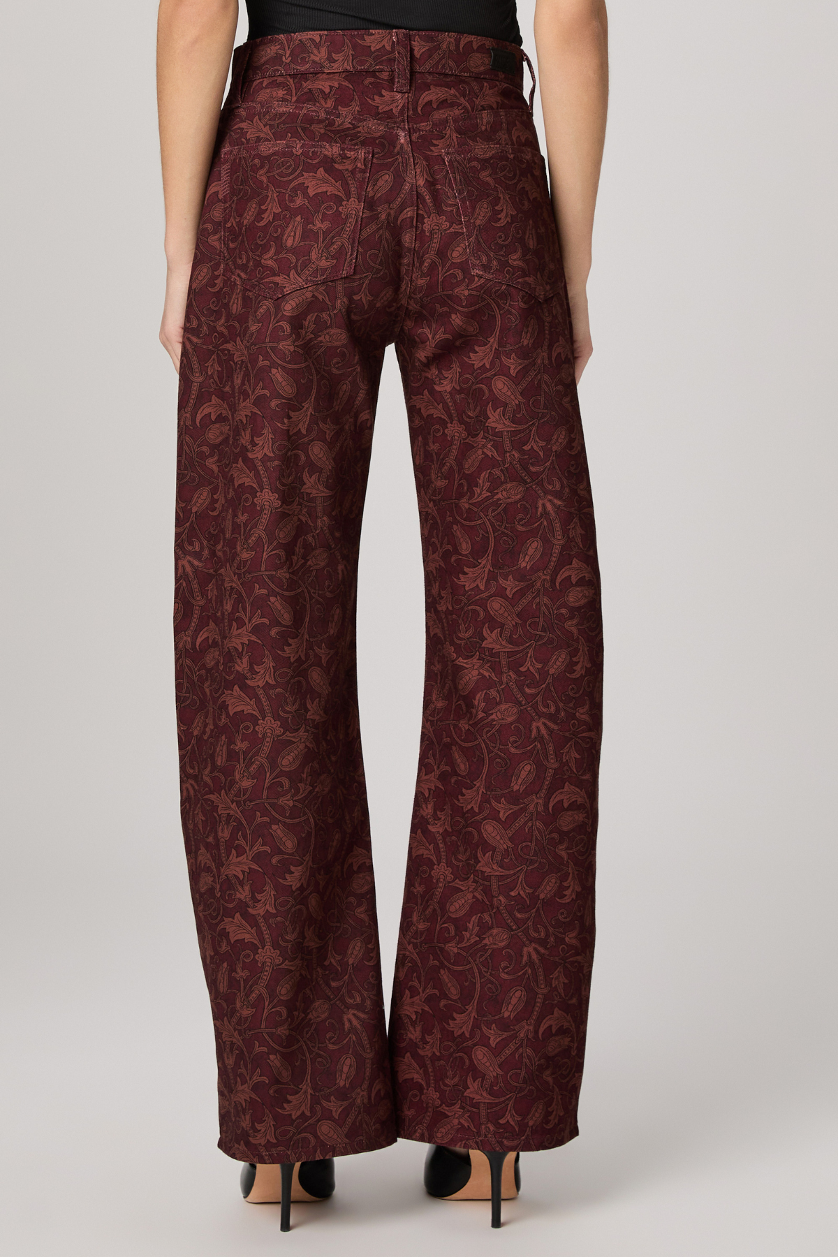 Women's printed full-length pants featuring an etched tulip pattern in rich garnet tones.