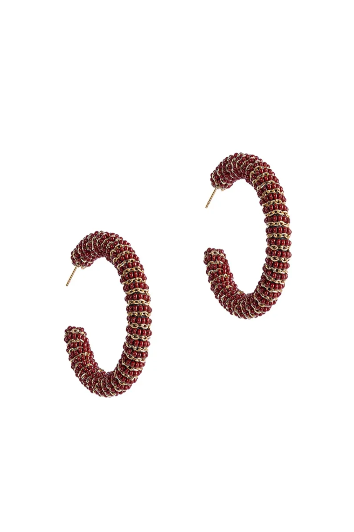 A pair of textured, spiral-shaped hoop earrings in a deep red and gold pattern, displayed on a clean white background.