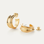 Gold hoop earrings with a smooth, polished finish.