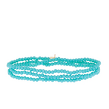 Turquoise beaded bracelet on a white background