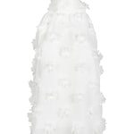 White dress with ruffled details on a white background