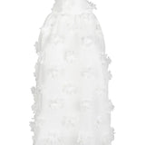White dress with ruffled details on a white background