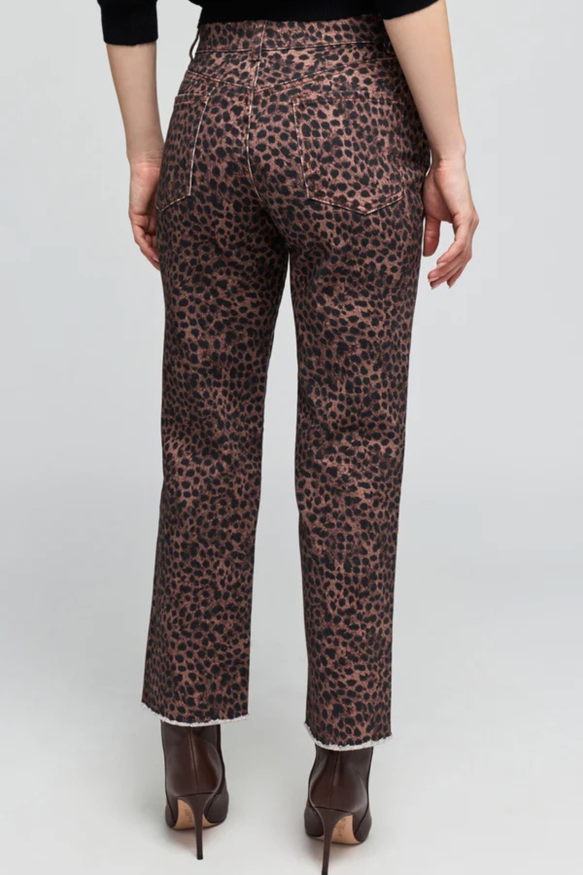 Women's leopard print jeans featuring a full-length silhouette and allover animal pattern.