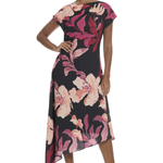 Model wearing a floral printed midi dress with cap sleeves, an asymmetrical hem, and a feminine flowing silhouette.