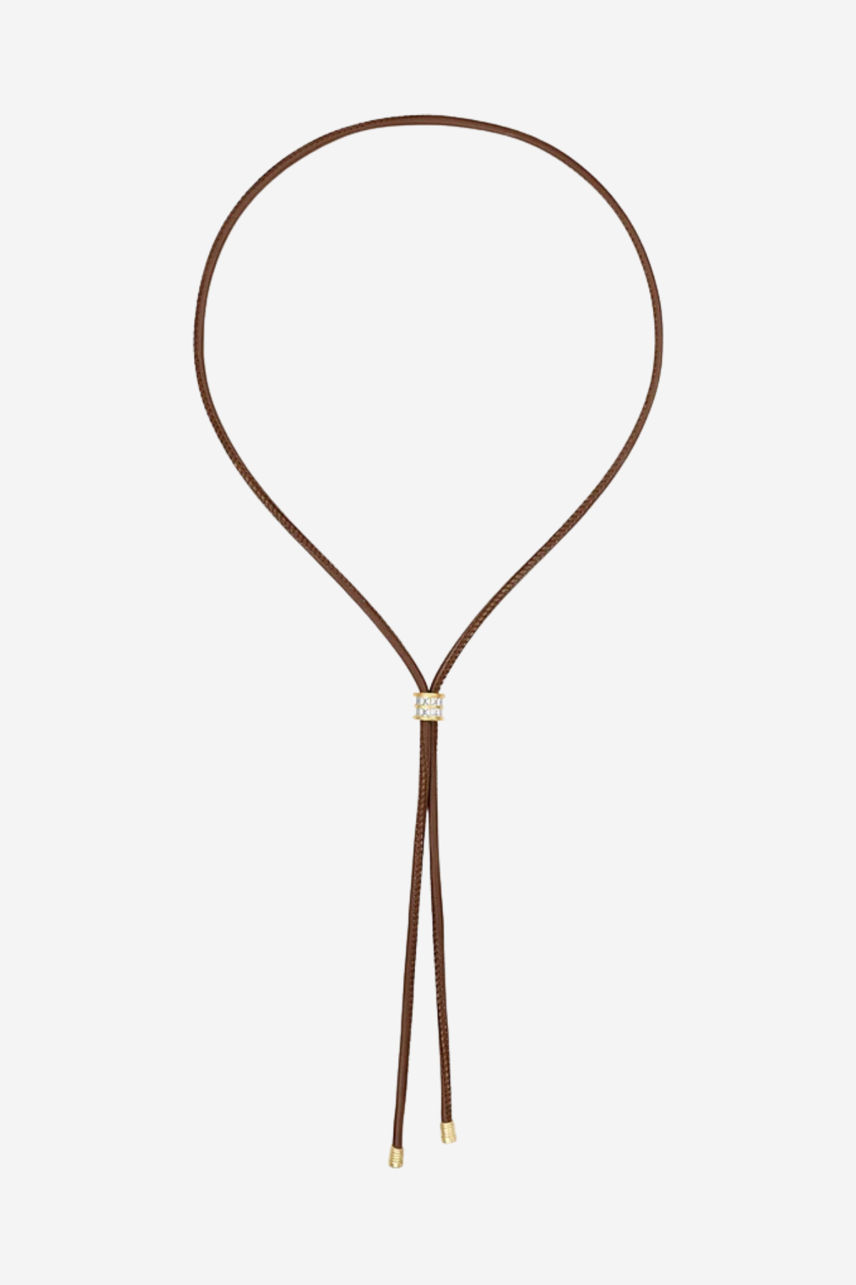 A brown leather cord necklace with a small gold-toned square charm and dangling cord ends, shown on a plain light gray background.