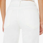 White pants worn by a person with a neutral background