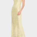 Woman wearing a light yellow sequin dress on a white background