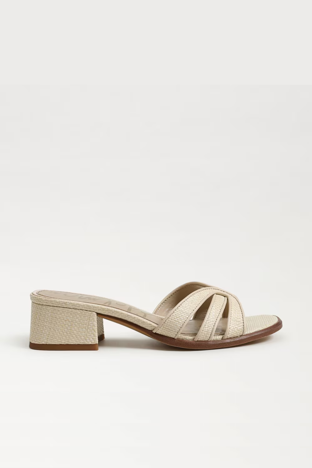 Beige sandal with a block heel on a white background