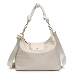 Beige handbag with a white strap on a white background