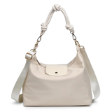 Beige handbag with a white strap on a white background