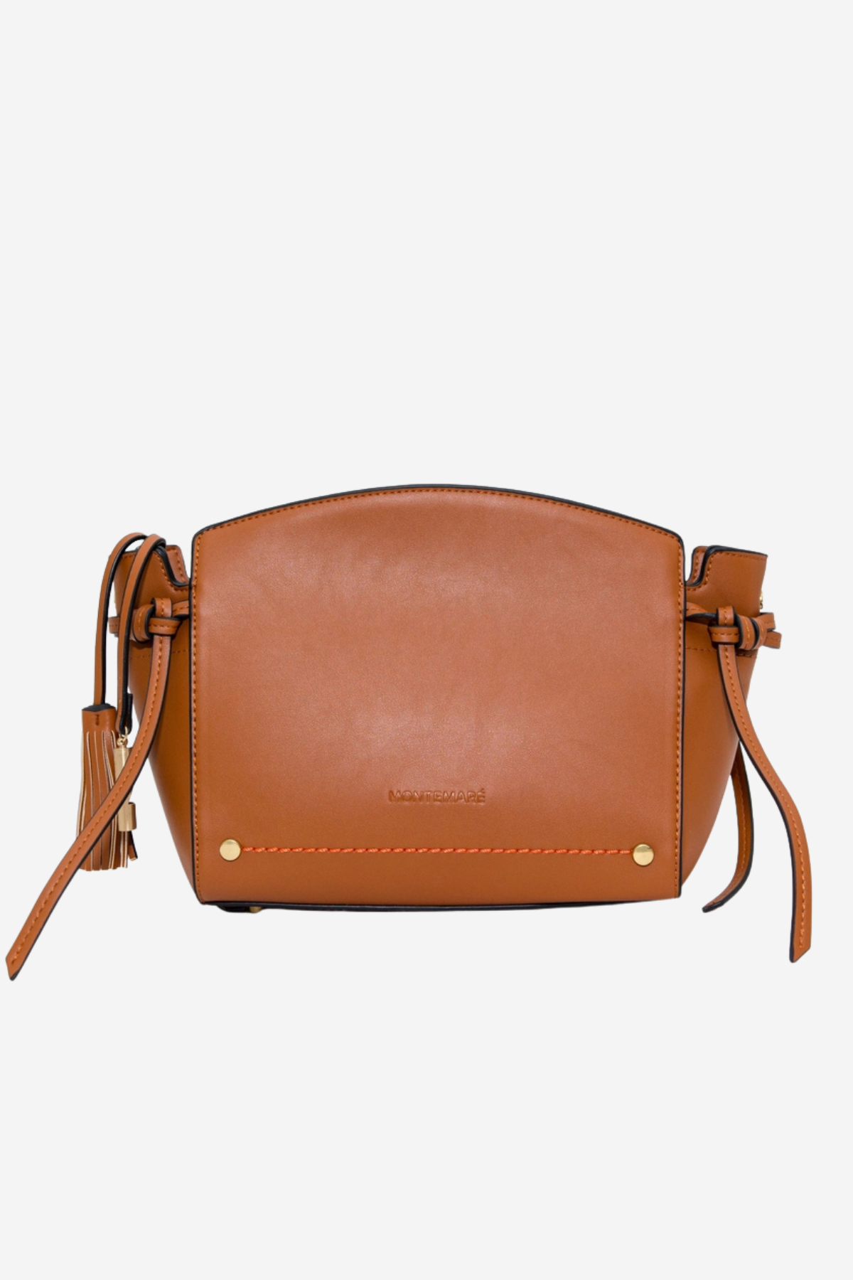 A tan leather crossbody bag with a curved top, tassel details on the straps, and small gold-tone hardware, shown against a plain light gray background.