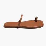 Brown sandal with a single strap on a white background