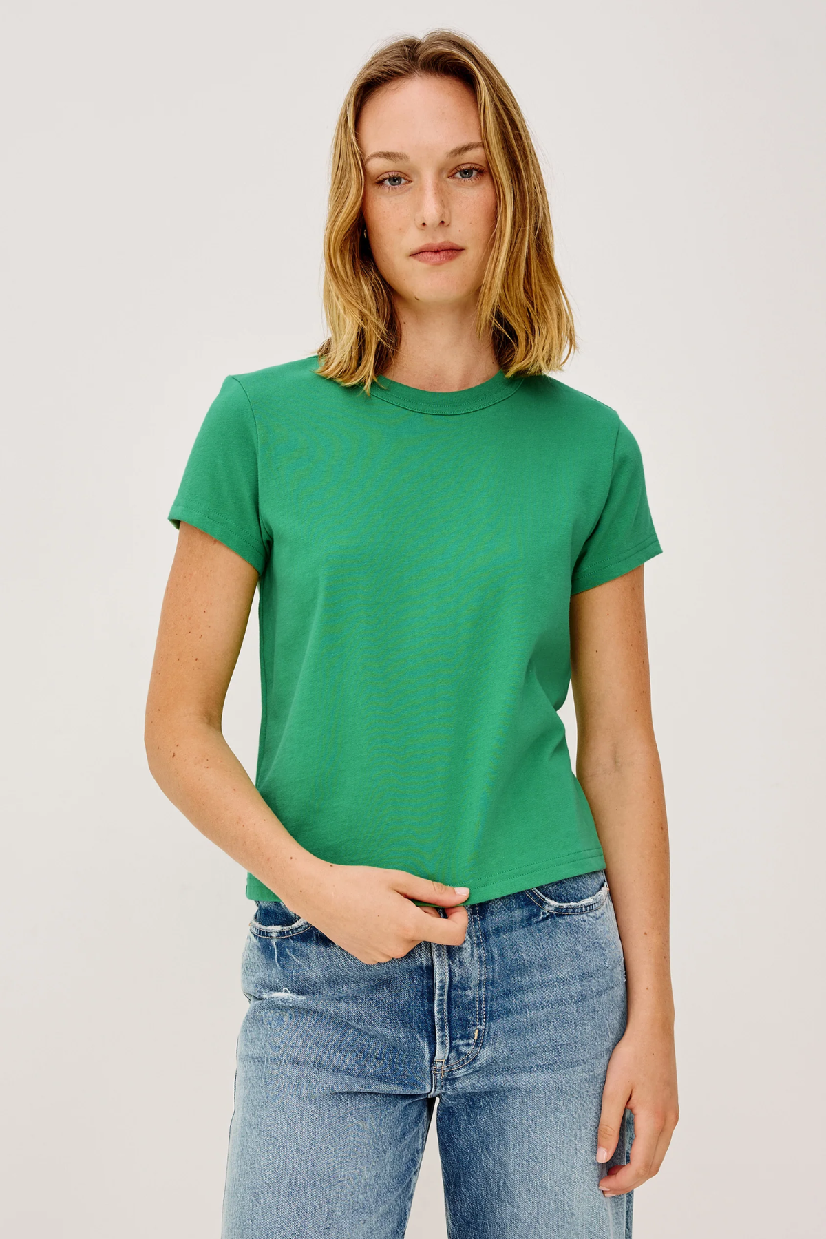 woman in green t-shirt 