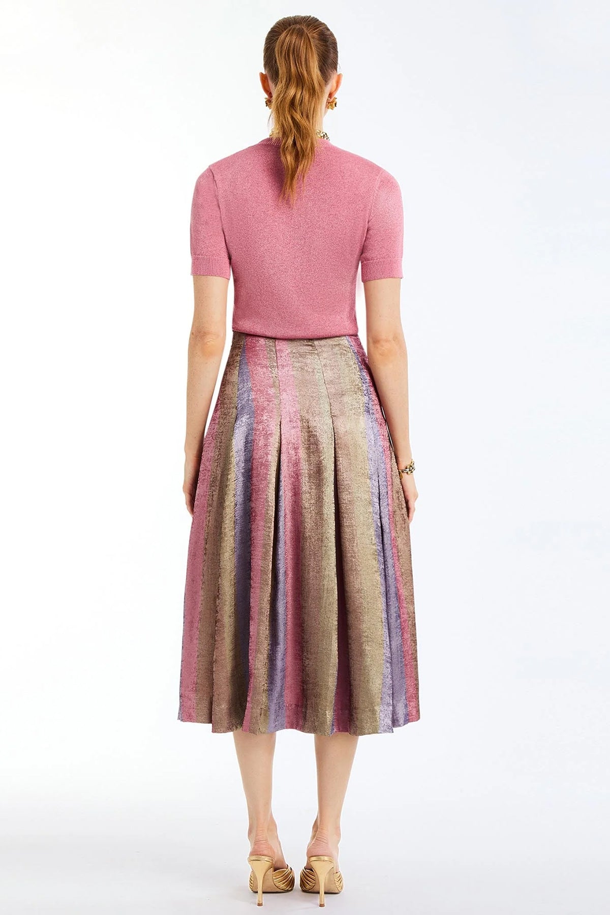 Pleated midi skirt with a soft, flowing silhouette and multicolor tones