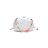 White handbag with gold chain strap on a white background