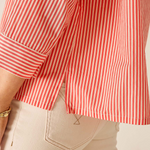 close up on woman in striped shirt 