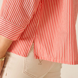 close up on woman in striped shirt 