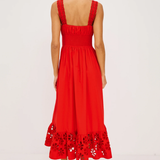 Red dress with floral embroidery on a white background