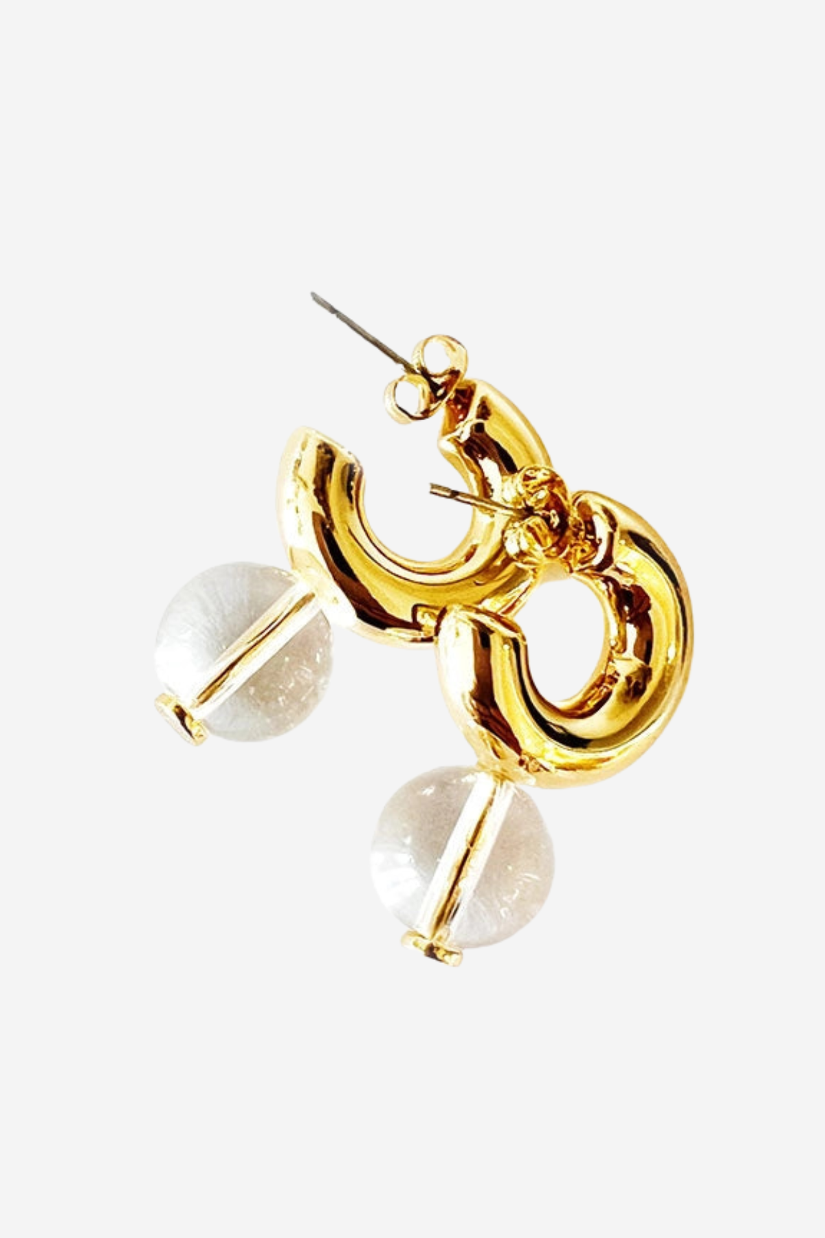 Gold-toned statement earrings featuring a polished abstract curved loop design with clear faceted round stone drops, shown on a light gray background.