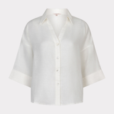 white linen blouse on white background 