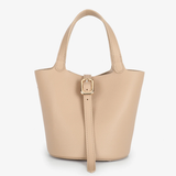 tan mini tote on white background 