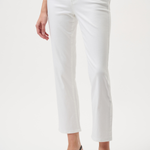 Person wearing white pants on a plain background