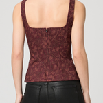Women's sleeveless vest featuring an etched tulip print in rich garnet and multicolor tones.