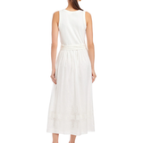 Woman wearing a white dress on a white background