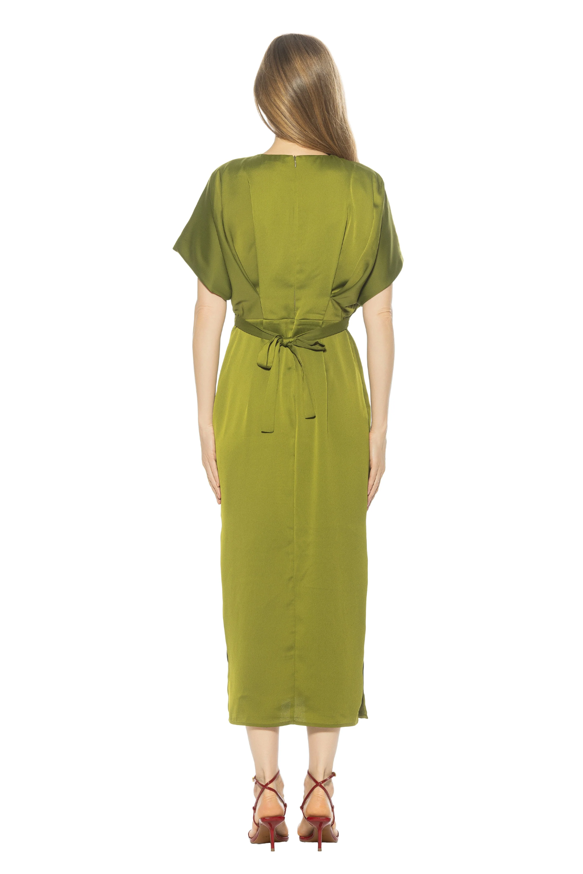 Woman wearing a green dress on a white background