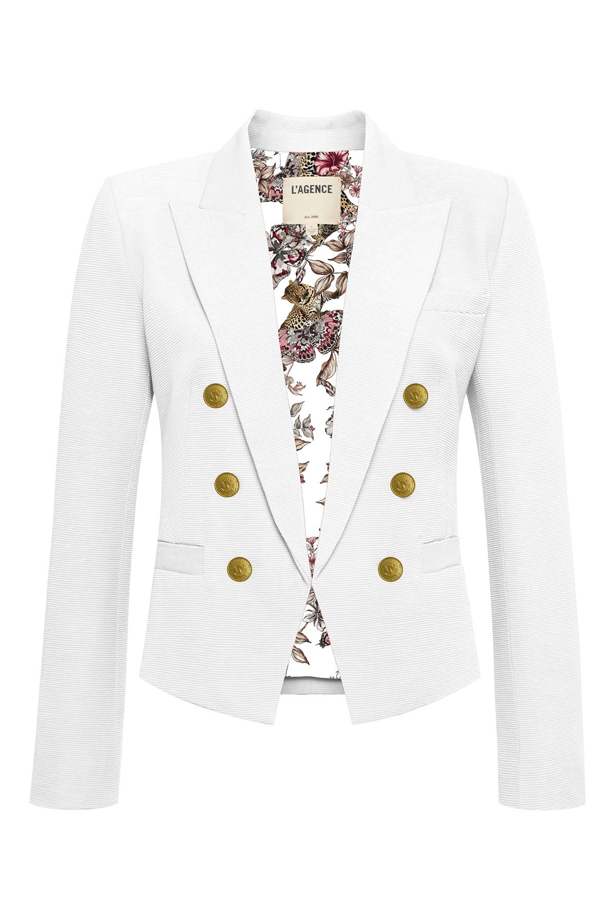 White blazer with gold buttons over a floral dress on a white background