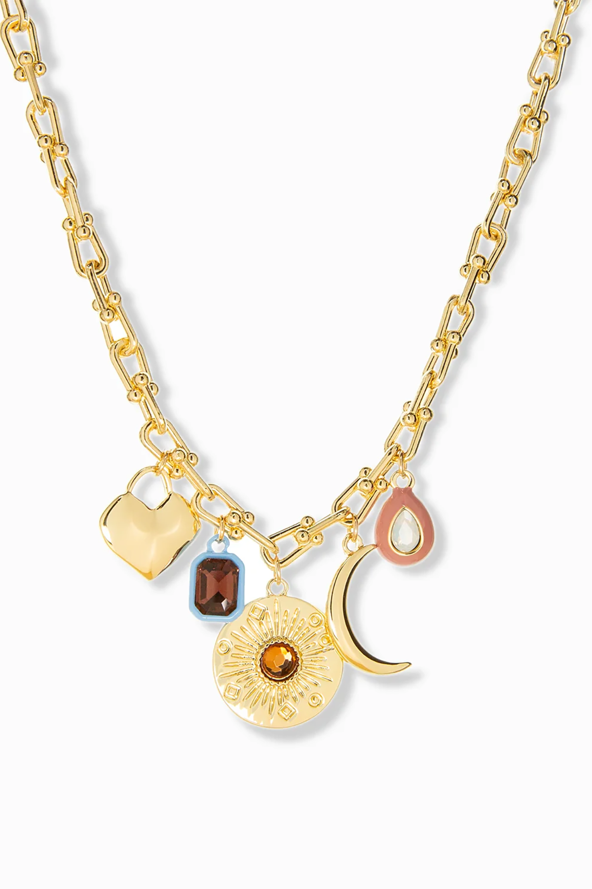 Gold necklace with various charms on a white background