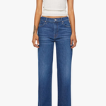 Person wearing blue jeans and a white crop top on a white background