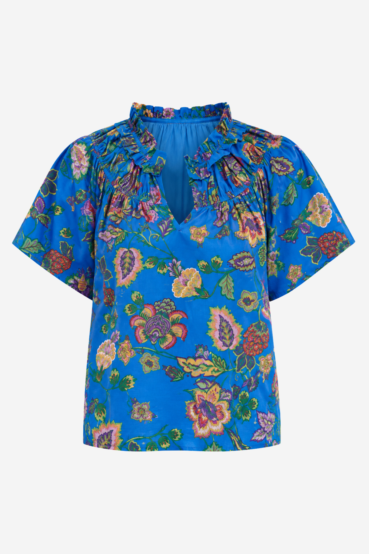 A vibrant blue short-sleeve blouse with a multicolor floral and paisley print, featuring a ruffled high neckline and tie-front detail, shown against a plain light gray background.