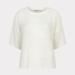 White textured top on a light beige background
