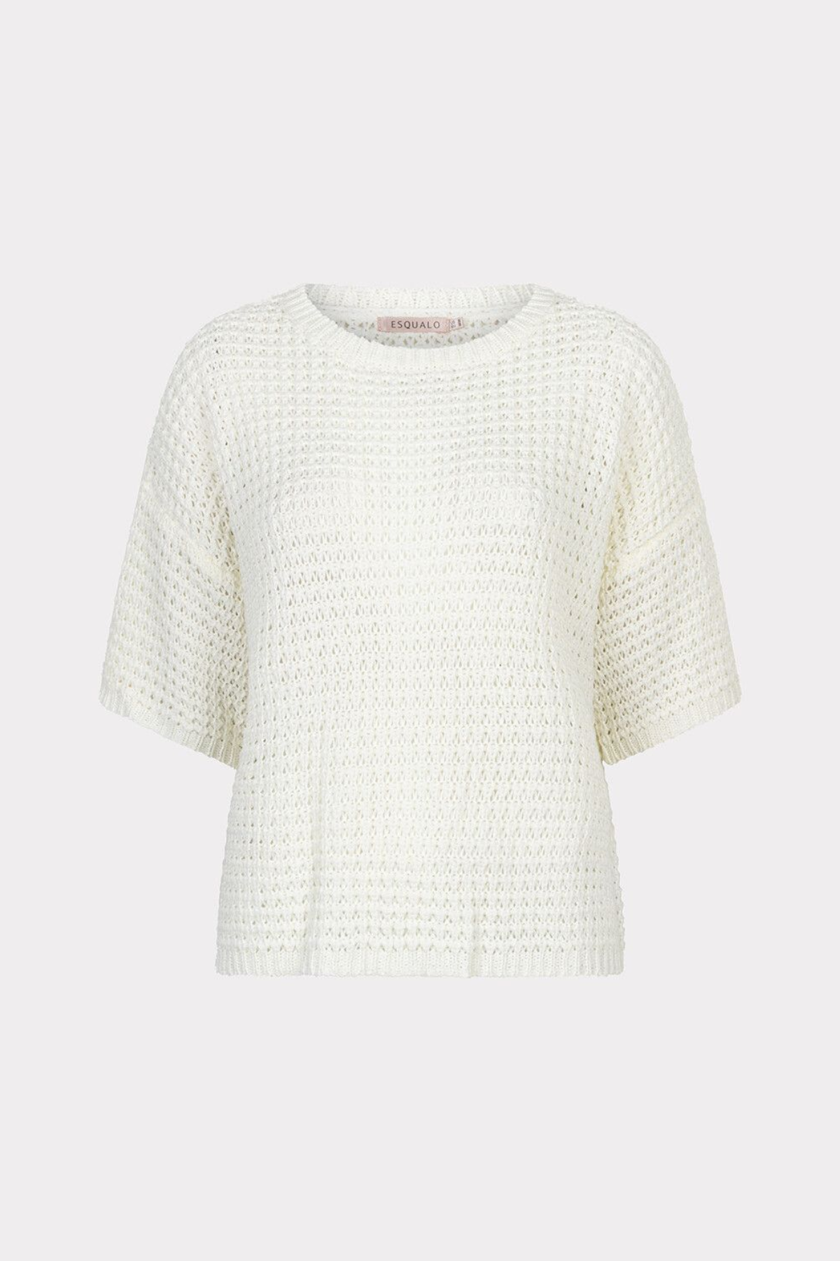 White textured top on a light beige background