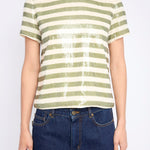 Striped top with subtle sequin detailing, styled for evening wear