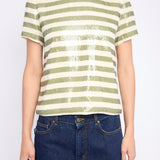 Striped top with subtle sequin detailing, styled for evening wear