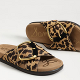 Leopard print sandals with gold buckles on a white background